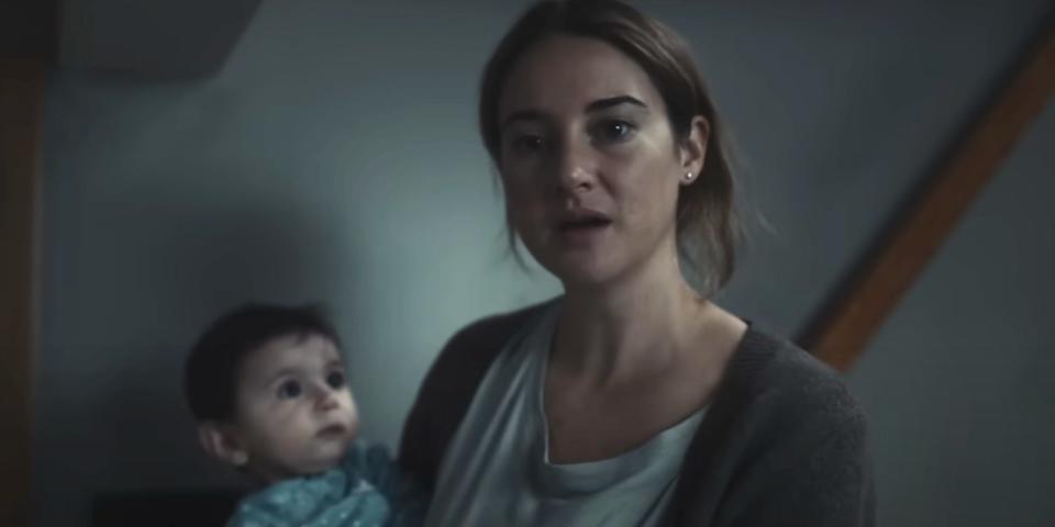 Shailene Woodley's character holding a baby in "Dumb Money."