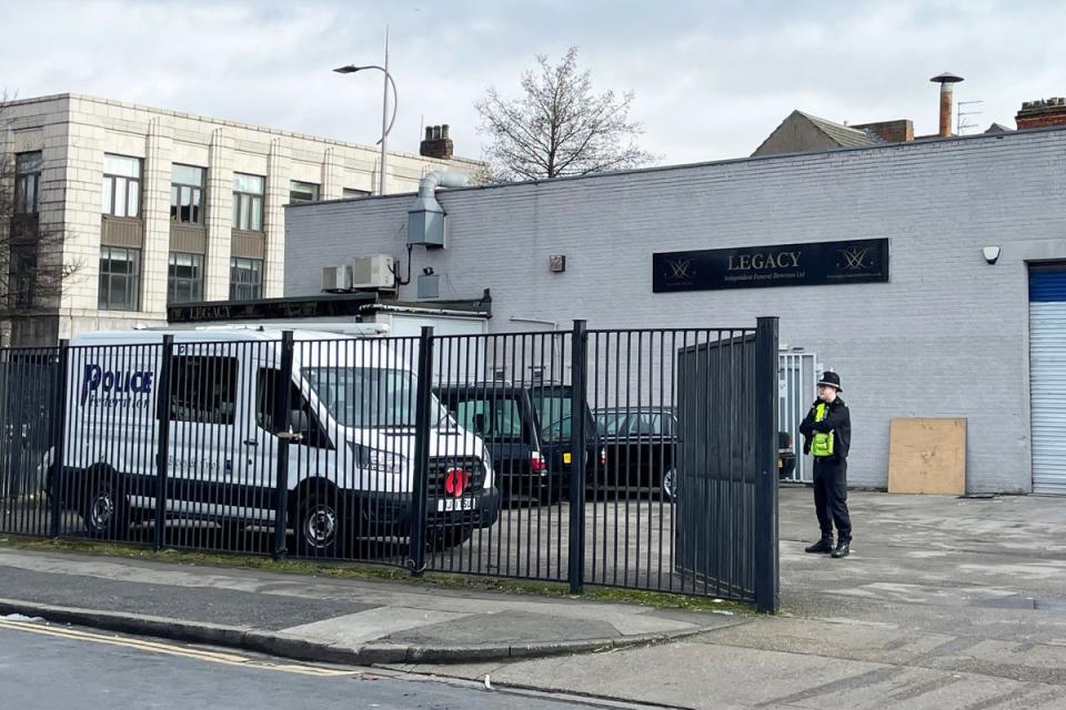 Police outside the Hessle Road branch of Legacy Independent Funeral Directors in Hull (PA) (PA Wire)