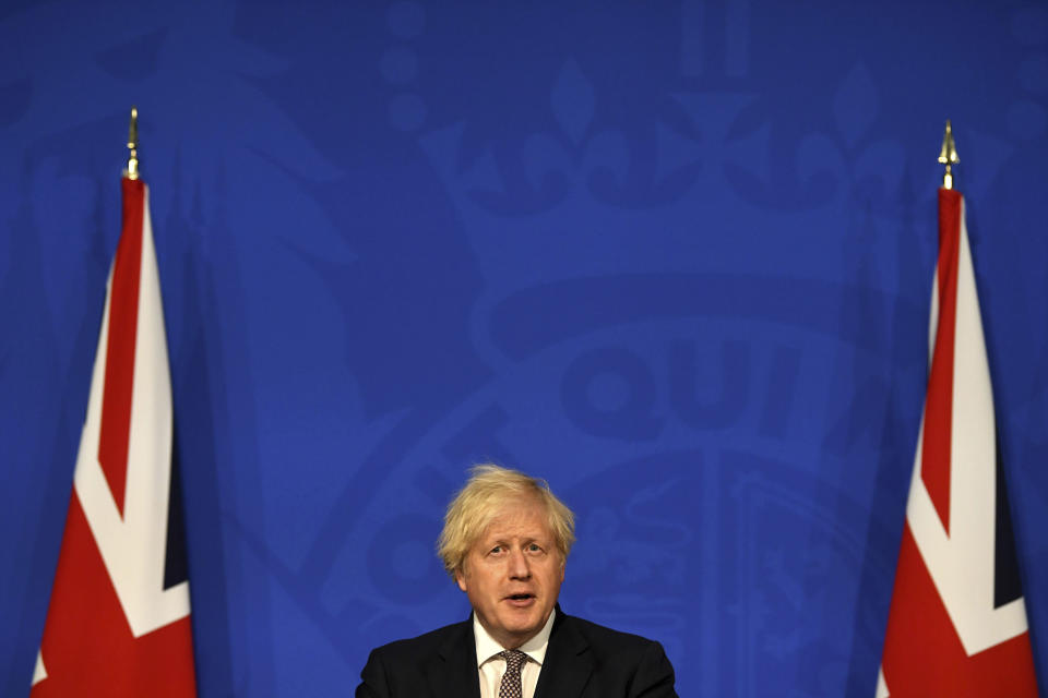 Britain's Prime Minister Boris Johnson speaks during a media briefing on coronavirus in Downing Street, London, Monday, July 5, 2021. Johnson on Monday confirmed plans to lift mask requirements and social distancing rules as planned on July 19 despite a surge in infections. (Daniel Leal-Olivas/Pool Photo via AP)
