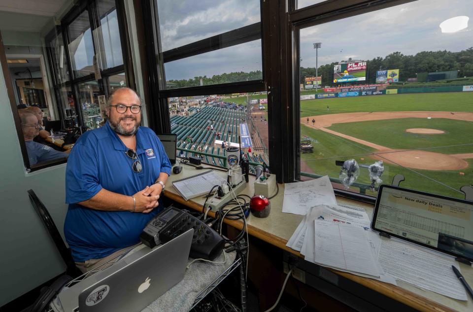 Jersey Shore BlueClaws' play-by-play man Greg Giombarrese gets ready for a recent game at ShoreTown Ballpark in Lakewood, N.J. on Aug. 15, 2023.
