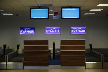 A check-in desk area with Ryanair signage is seen at the airport in Lodz October 10, 2014. REUTERS/Kacper Pempel