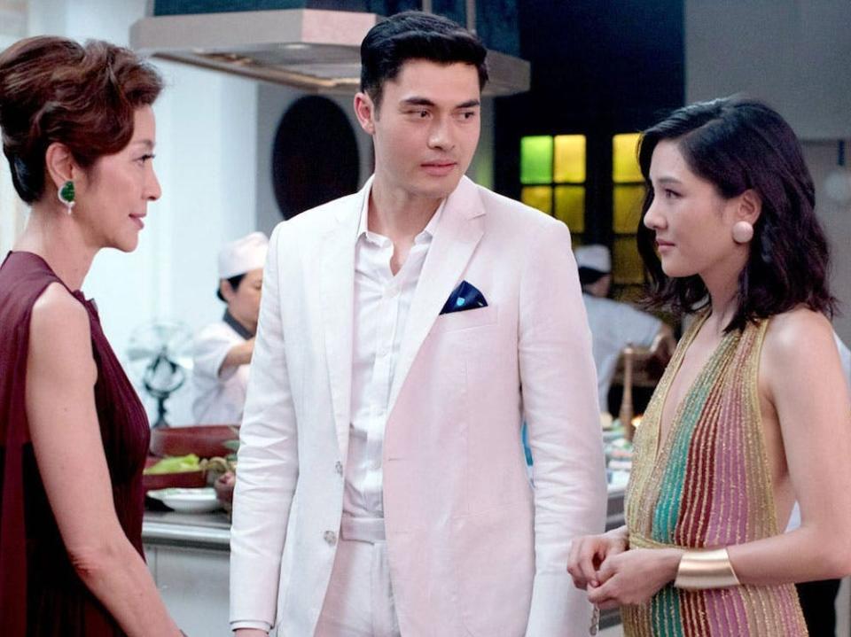 Michelle Yeoh as Eleanor Sung-Young, Henry Golding as Nick Young, and Constance Wu as Rachel Chu in "Crazy Rich Asians."