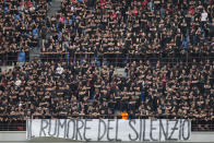 AC Milan fans show a banner reading: "The noise of the silence" during a Serie A soccer match between AC Milan and Genoa, at the San Siro stadium in Milan, Italy, Sunday, May 5, 2024. (AP Photo/Luca Bruno)