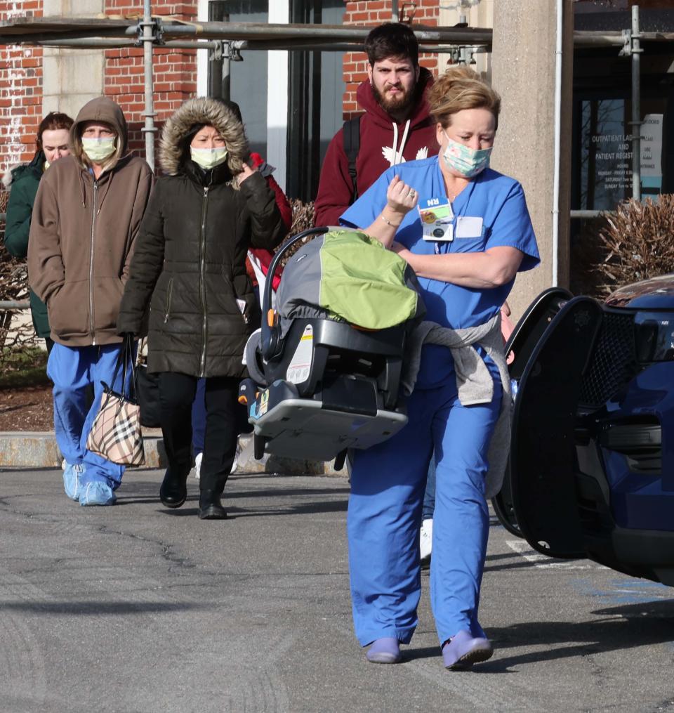 Newborn babies are evacuated at Signature Healthcare Brockton Hospital after a transformer fire broke out in the basement of a building on the campus on Tuesday, Feb. 7, 2023.