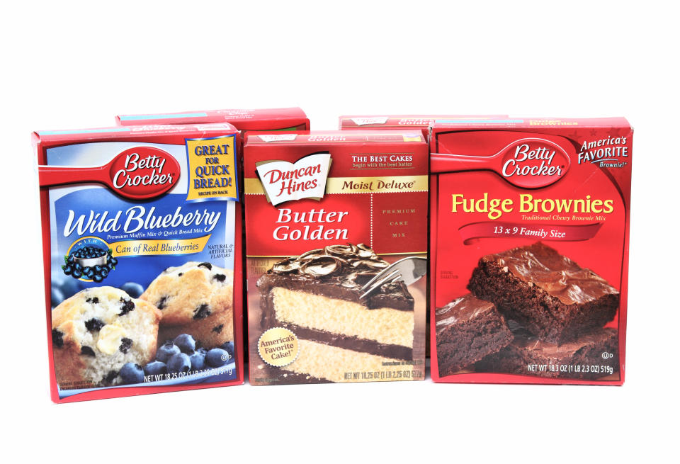 West Palm Beach, USA - October 28, 2011: This is a studio product shot of boxes of various mixes for cakes, blueberry muffins and fudgge brownies by Duncan Hines and Betty Crocker.