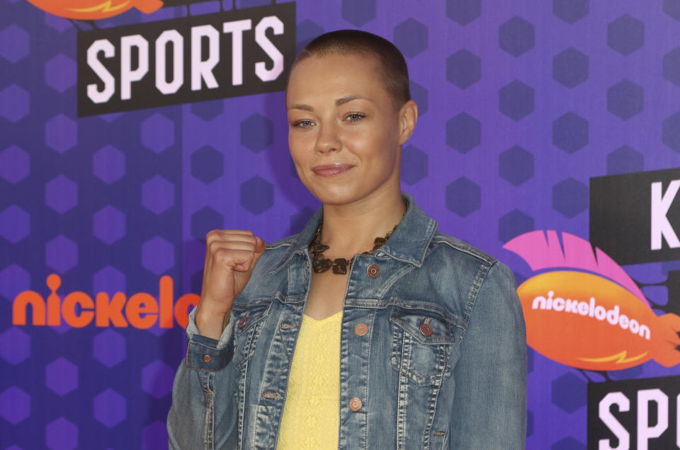 FILE - In this July 19, 2018, file photo, UFC fighter Rose Namajunas arrives at the Kids' Choice Sports Awards in Santa Monica, Calif. The manager of Rose Namajunas says the former UFC strawweight champion won't fight at UFC 249 on April 18 after two deaths in her family related to the coronavirus pandemic. Brian Butler posted the news on Instagram on Thursday, April 9, 2020. (Photo by Willy Sanjuan/Invision/AP, File)