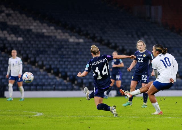 Lauren James, right, scores England’s third goal