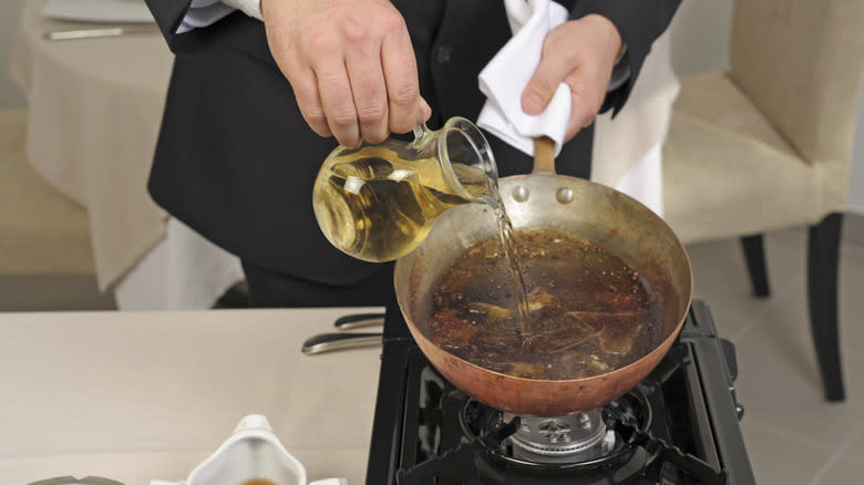 Deglazing a pan with wine