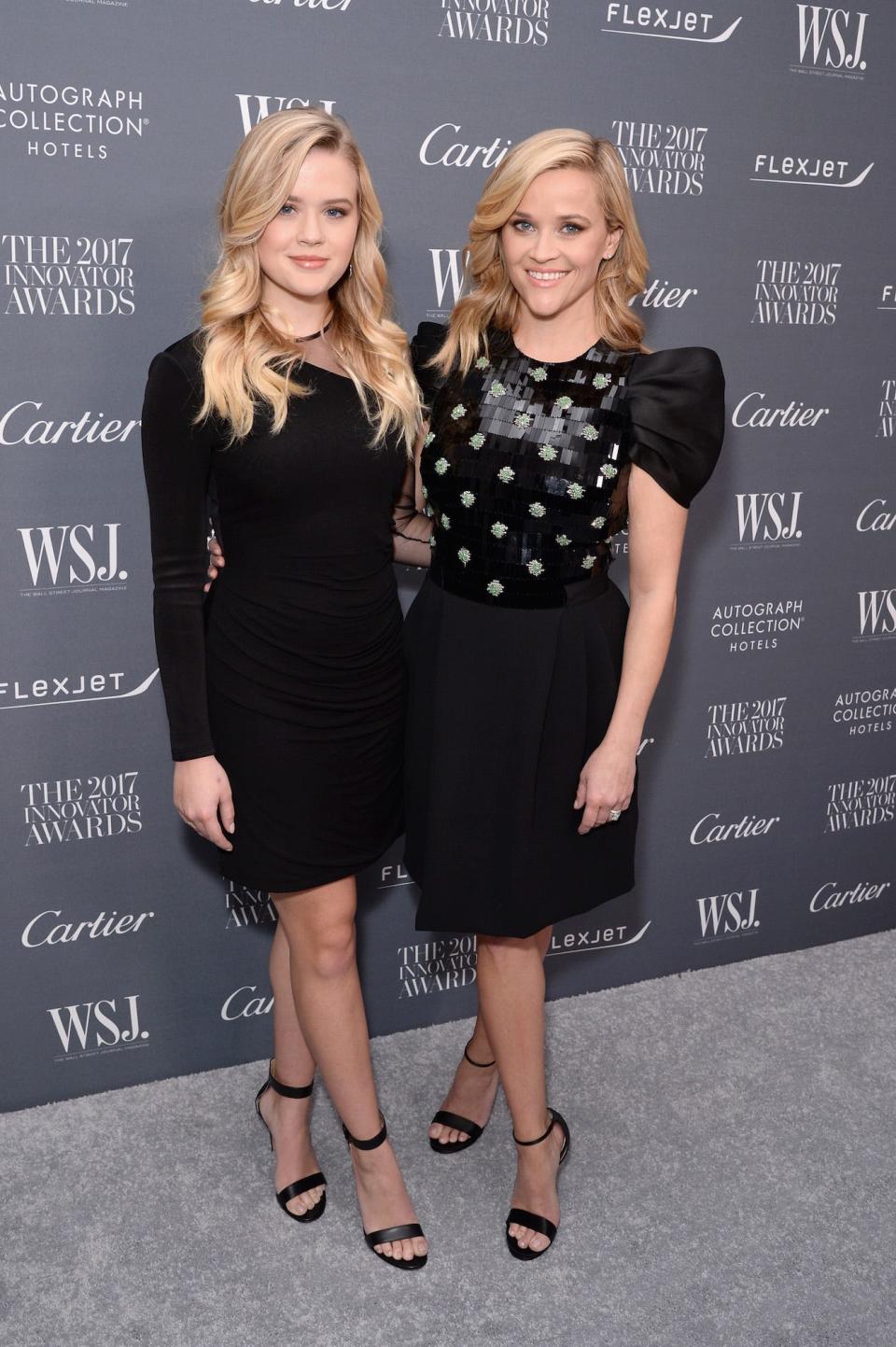 Ava Phillippe and Reese Witherspoon pose together in coordinated outfits on November 1, 2017.