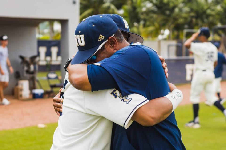 Mervyl Melendez, seen here hugging his son Jayden, stepped down as FIU’s coach. According to a source, Melendez was asked to resign after a 126-152 overall record and a 61-87 Conference USA mark in six years leading the Panthers.