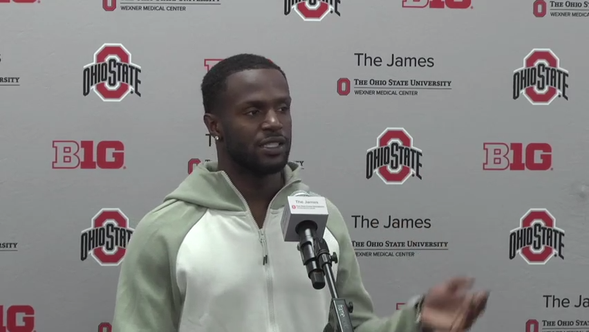 Former Ohio State University defensive back Marcus Williamson has been charged with aggravated robbery in connection with a Wednesday bank robbery.