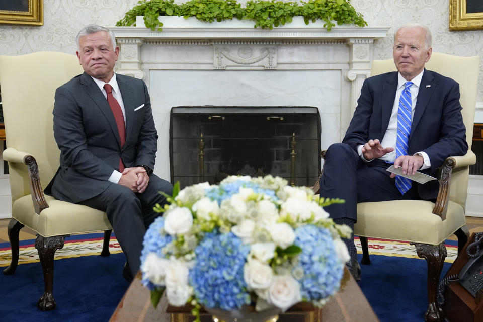 President Joe Biden, right, meets with Jordan's King Abdullah II, left, in the Oval Office of the White House in Washington, Monday, July 19, 2021. (AP Photo/Susan Walsh)