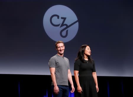 REFILE - CORRECTING TYPOPriscilla Chan (R) and her husband Mark Zuckerberg announce the Chan Zuckerberg Initiative to "cure, prevent or manage all disease" by the end of the century during a news conference at UCSF Mission Bay in San Francisco, California, U.S. September 21, 2016. REUTERS/Beck Diefenbach