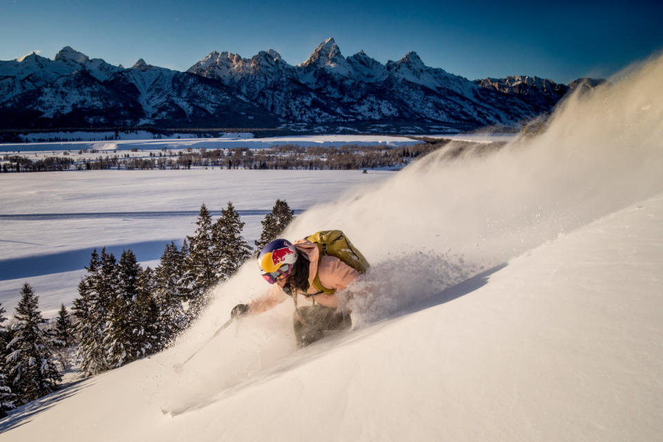 Michelle Parker flanks a turn in front of the Tetons in Jackson, Wyoming, USA on 7 February, 2019.<p>Photo: Aaron Blatt/Red Bull Content Pool</p>