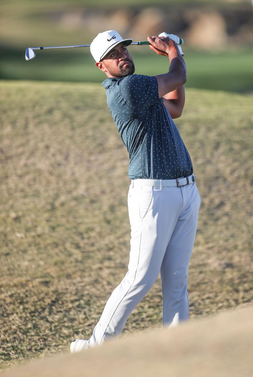 Tony Finau hits an approach shot on the 18th hole of the Stadium Course during the American Express at PGA West in La Quinta, January 24, 2021. 