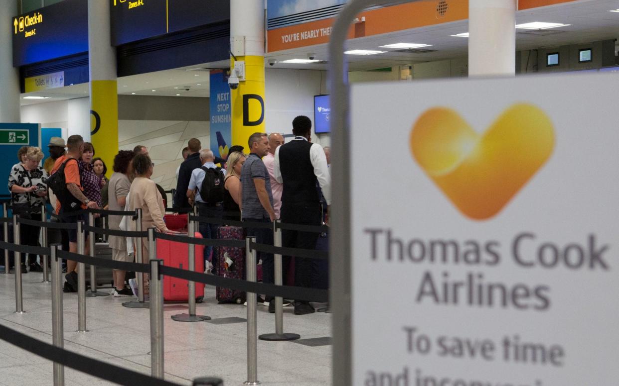 A general view of the Thomas Cook check-in desks in the South Terminal of Gatwick Airport - PA