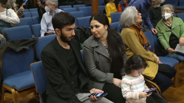 PHOTO: Negin Khpolwak, her husband, Hamid, and 2-year-old daughter attend a charity concert for Afghan refugees at an Episcopal church on Capitol Hill in Washington, D.C. (ABC News)