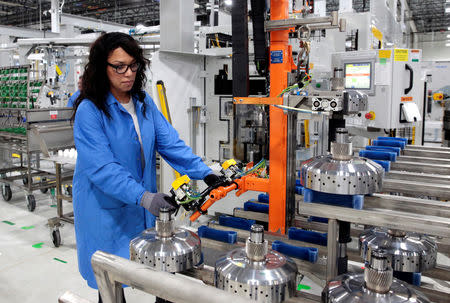 General Motors production worker Dina Mays works on the 10-speed transmission assembly at the General Motors (GM) Powertrain Transmission plant in Toledo, Ohio, U.S. March 6, 2019. REUTERS/Rebecca Cook/Files