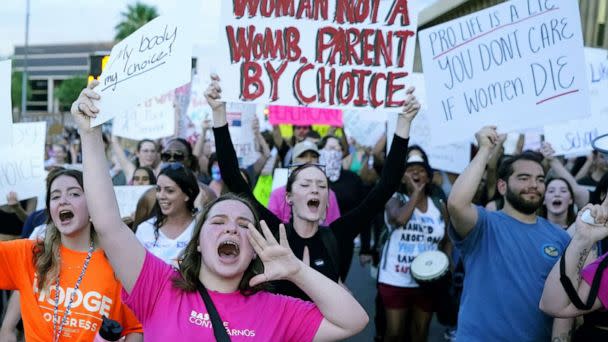 PHOTO: In this June 24, 2022, file photo, protesters in Phoenix shout as they join thousands marching around the Arizona state Capitol after the U.S. Supreme Court decision to overturn the landmark Roe v. Wade abortion decision. (Ross D. Franklin/AP, FILE)
