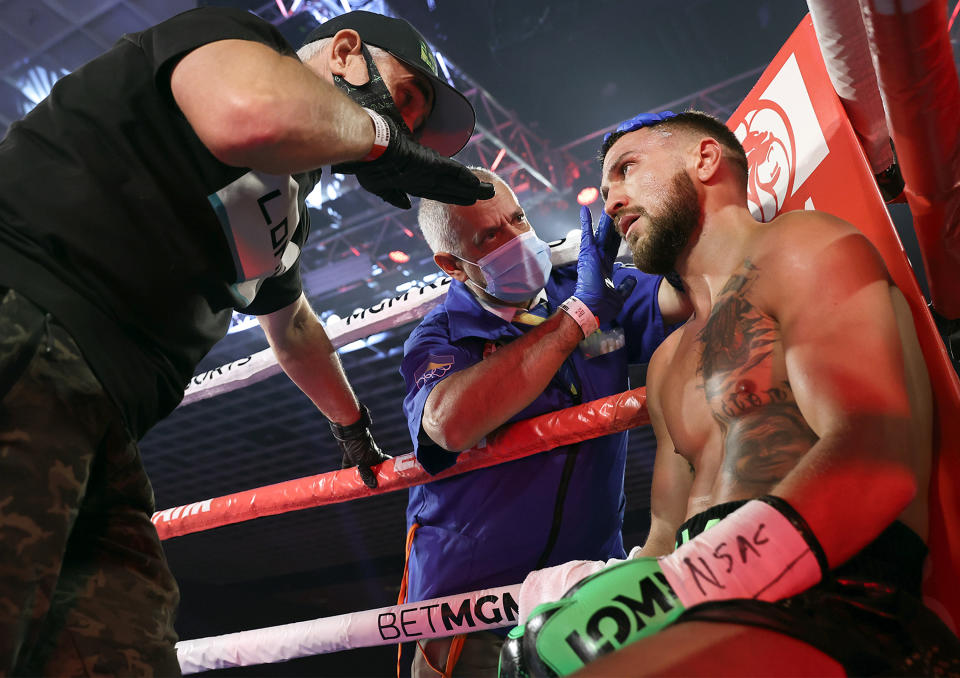 LAS VEGAS, NEVADA - OCTOBER 17: In this handout image provided by Top Rank, Vasiliy Lomachenko sits in his corner during the Lightweight World Title bout against Teofimo Lopez Jr (not pictured) at MGM Grand Las Vegas Conference Center on October 17, 2020 in Las Vegas, Nevada. (Photo by Mikey Williams/Top Rank via Getty Images)