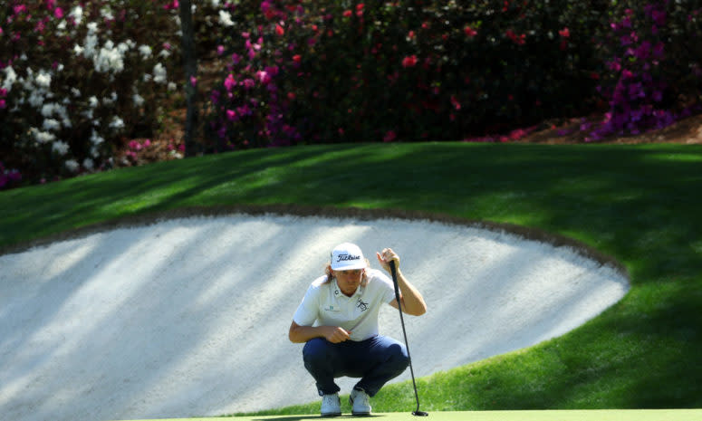 Cameron Smith lines up a putt at the Masters.