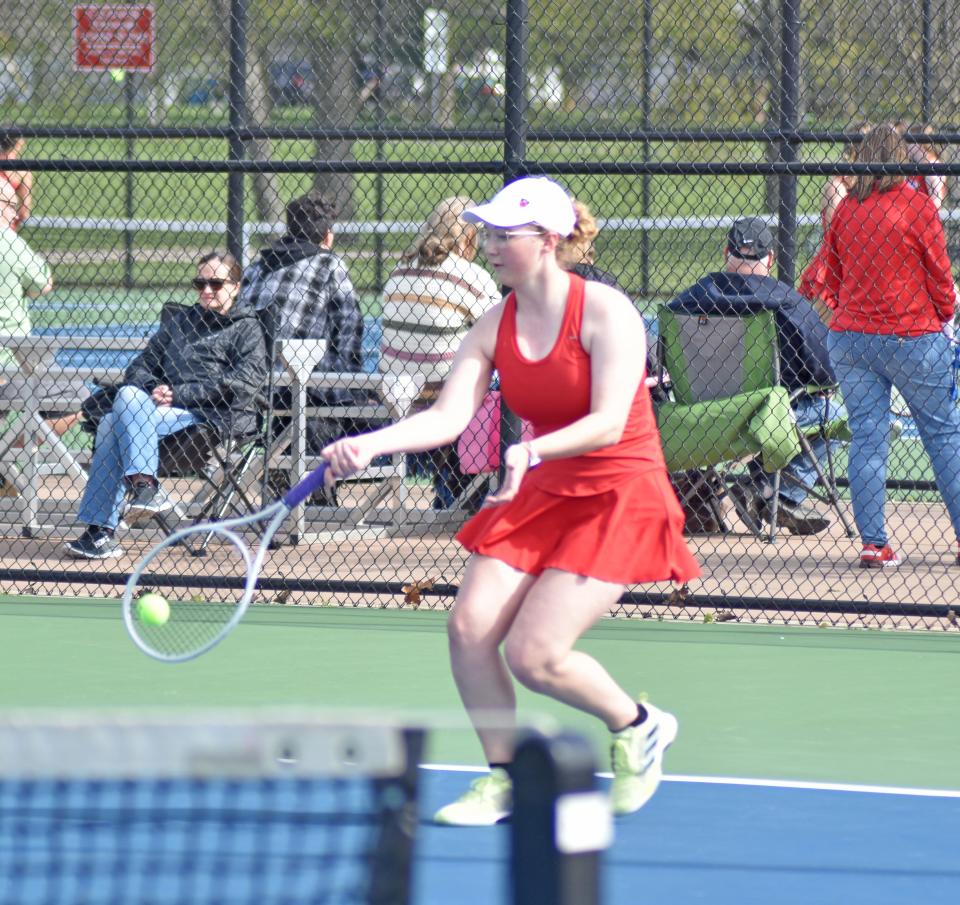 Coldwater's no. 1 singles player Janet Rucker blasts a forehand Monday versus Marshall