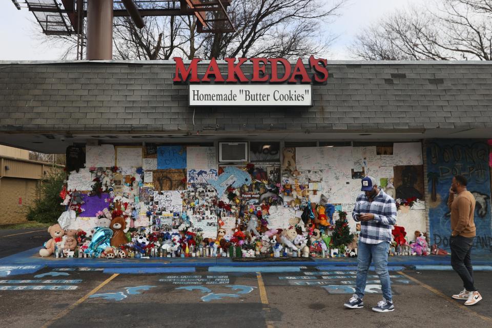 The memorial for rapper Young Dolph continues to grow at the site where he was murdered, more than a month after his death, on Thursday, Dec. 30, 2021. Young Dolph, whose given name was Adolph Robert Thornton Jr., was shot and killed in Memphis on Nov. 17, 2021. 