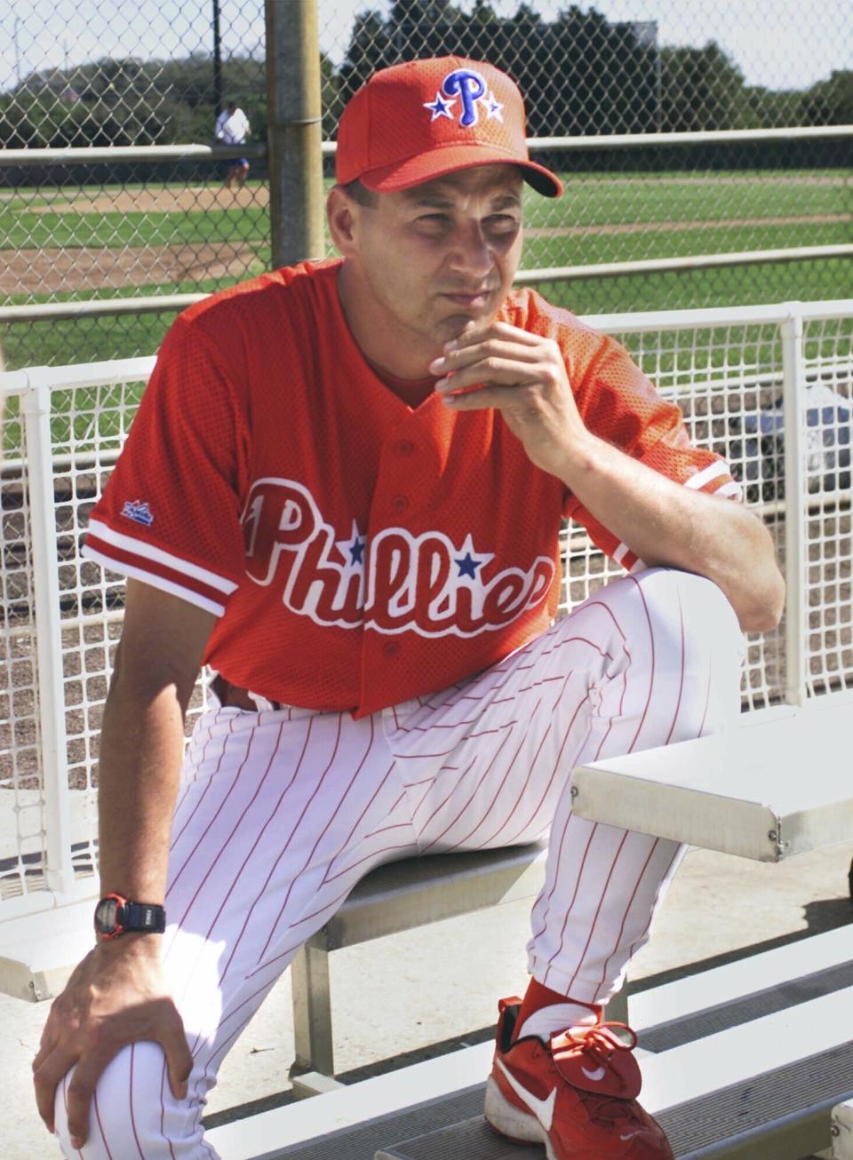 FILE - Philadelphia Phillies manager Terry Francona watches spring training practice Saturday, Feb. 19, 2000, at the Carpenter Complex in Clearwater, Fla. Slowed by major health issues in recent years, the personable, popular Francona may be stepping away, but not before leaving a lasting imprint as a manager and as one of the game's most beloved figures. (AP Photo/Suzanne Plunkett, File)