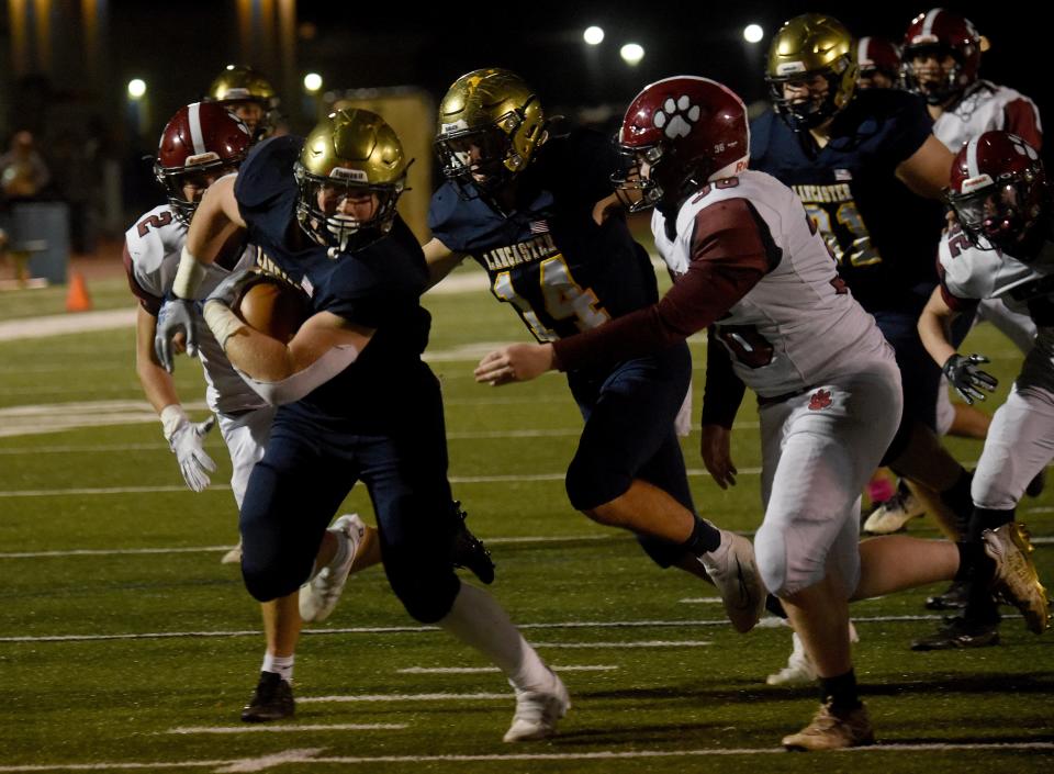 Lancaster junior Cole Dickerson carries the ball into the end zone against Newark. The Golden Gales defeated the visiting Newark Wildcats 49-14 in week 10 football on Friday, Oct. 21, 2022.