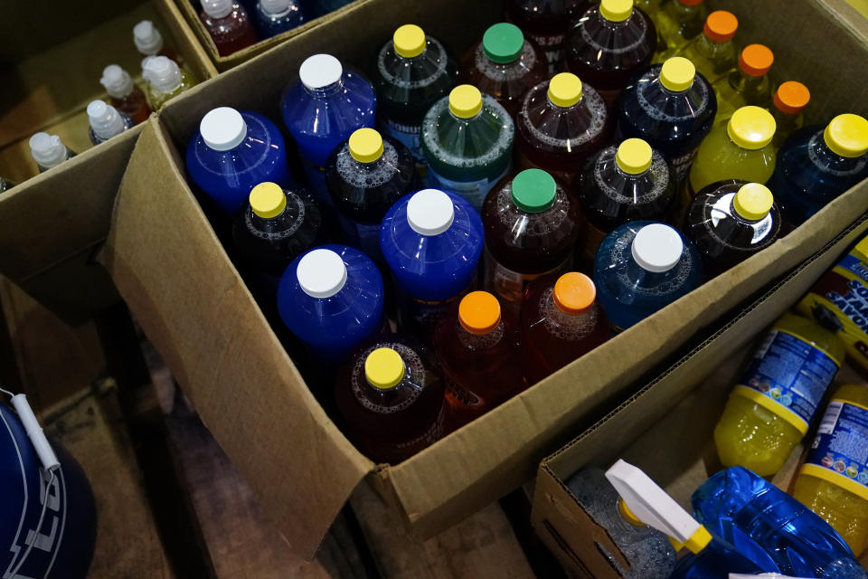 Supplies are delivered for flood relief at Knott County Sportsplex on Wednesday, Aug. 3, 2022, in Leburn, Ky., after massive flooding. (AP Photo/Brynn Anderson)