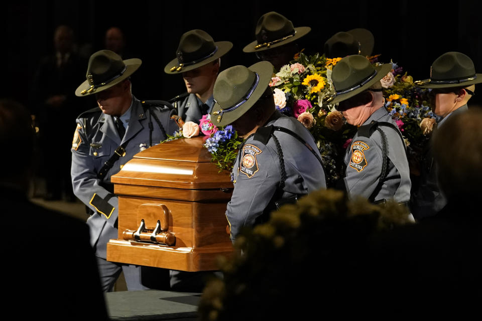 A Georgia State Patrol honor guard positions the casket of former first lady Rosalynn Carter at the Jimmy Carter Presidential Library and Museum in Atlanta, Monday, Nov. 27, 2023, where members of the public paid respects as she lay in repose. (AP Photo/Brynn Anderson)