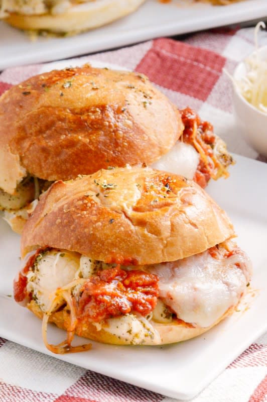 <p>The Weary Chef</p><p>CLICK >> <a href="https://wearychef.com/italian-chicken-sliders/" rel="nofollow noopener" target="_blank" data-ylk="slk:Cheesy Italian Chicken Sliders;elm:context_link;itc:0;sec:content-canvas" class="link ">Cheesy Italian Chicken Sliders</a> by The Weary Chef</p>