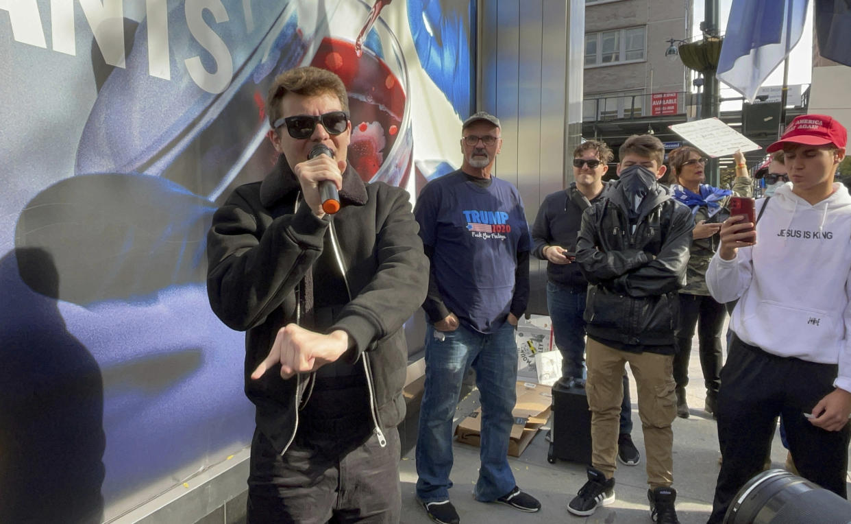 White nationalist Nick Fuentes speaks at a rally. 