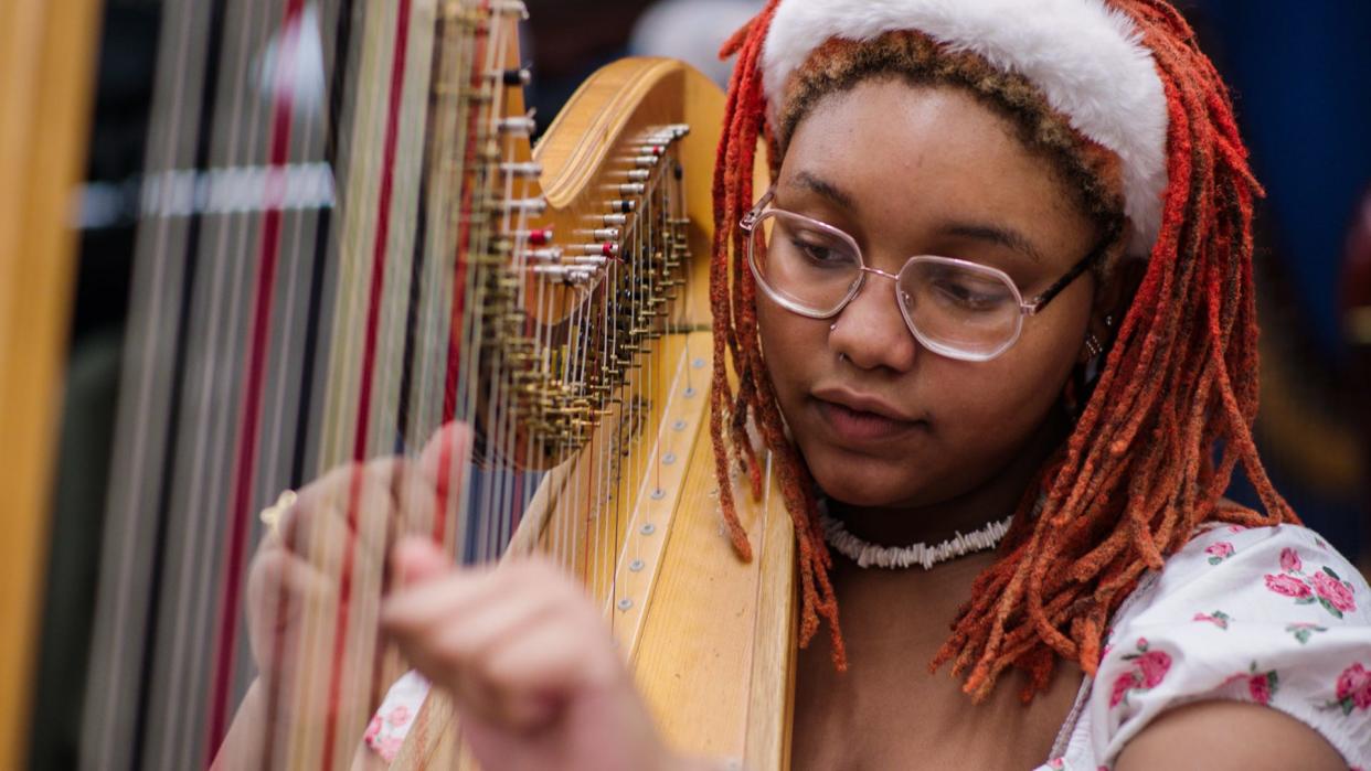 MiracleRay Davis, Grade 12, of Cass Technical High School, plays the harp. Students will have an opportunity to showcase their talents on one of the city's grandest stages Thursday, May 19, when “An Evening of Fine Arts” returns to the Fox Theatre.”