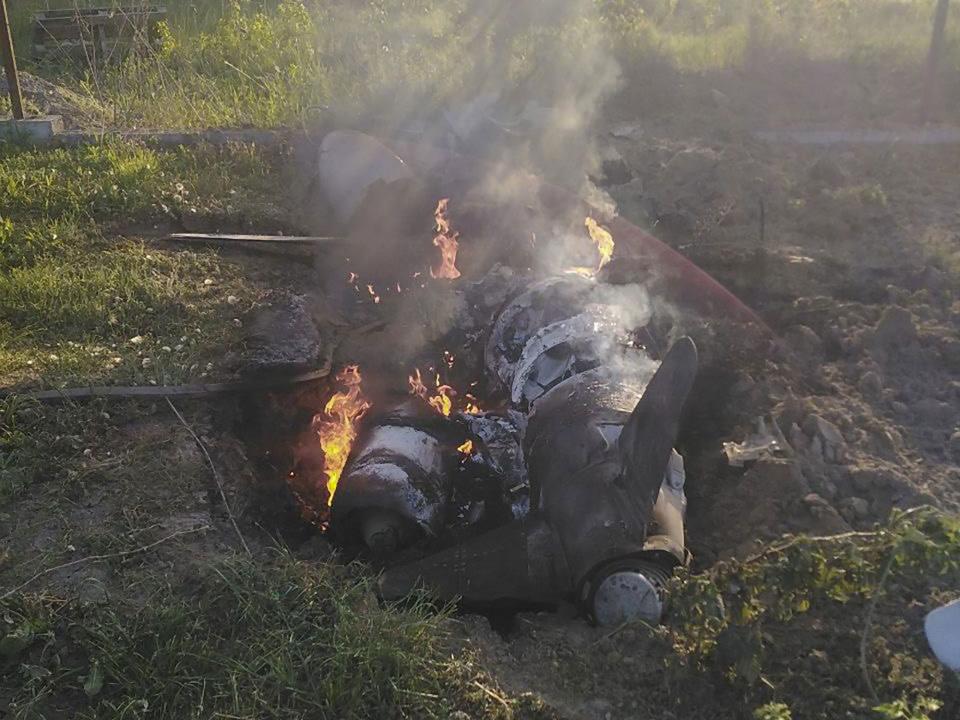 In this photo provided by the Ukrainian Police Press Office, fragments of a Russian rocket which was shot down by Ukraine’s air defence system are seen after the night rocket attack in the Kyiv region, Ukraine, Thursday, May 18, 2023. | Ukrainian Police Press Office via Associated Press