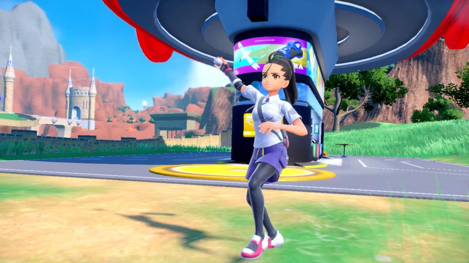 Trainer Nemona throwing a Pokéball