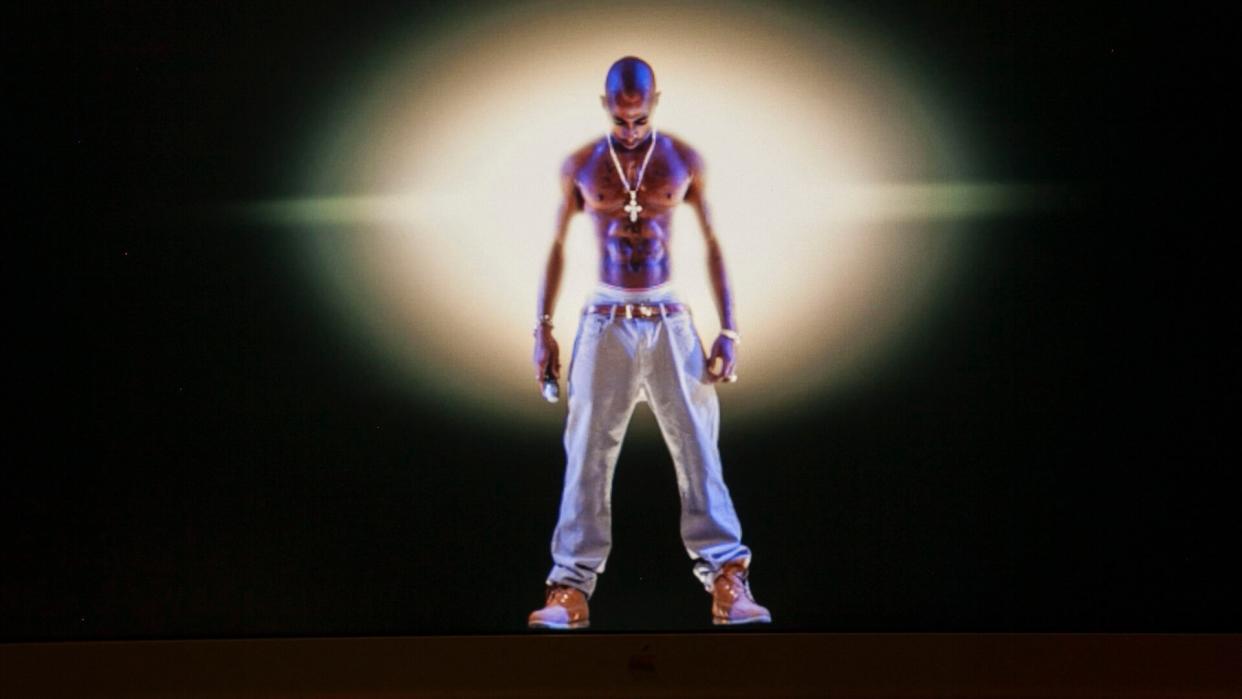 Mandatory Credit: Photo by Damian Dovarganes/AP/Shutterstock (6244237c)Tupac Shakur A video image of the Tupac Shakur hologram is displayed on a computer monitor at the Subtractive Studio in Santa Monica, Calif.