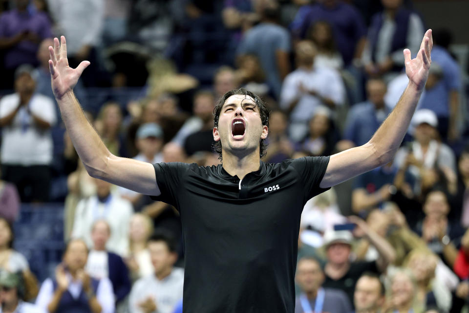 NEW YORK, NEW YORK - SEPTEMBER 06:  Taylor Fritz of the United States celebrates after defeating Frances Tiafoe of the United States in their Men's Singles Semifinal match on Day Twelve of the 2024 US Open at USTA Billie Jean King National Tennis Center on September 06, 2024 in the Flushing neighborhood of the Queens borough of New York City. (Photo by Jamie Squire/Getty Images)