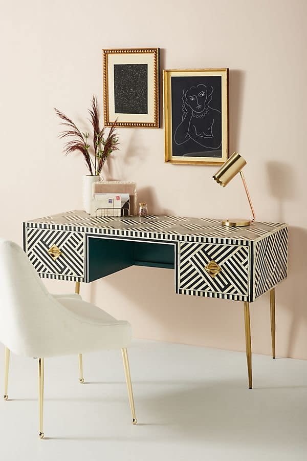 Get it at <a href="https://www.anthropologie.com/shop/optical-inlay-desk" target="_blank" rel="noopener noreferrer">Anthropologie</a>, $1,598.&nbsp;