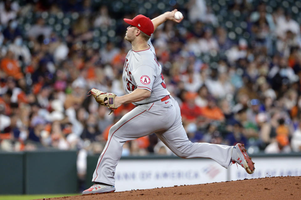 Los Angeles Angels starting pitcher Dylan Bundy (37) throws against the Houston Astros during the first inning of a baseball game Sunday, April 25, 2021, in Houston. (AP Photo/Michael Wyke)