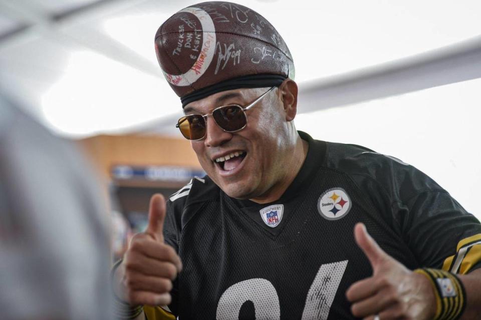 Albert Gamboa from Salt Lake City was having fun wearing his autographed football hat at the NFL Draft Experience Thursday, April 27, 2023, at the National WWI Museum and Memorial in Kansas City.