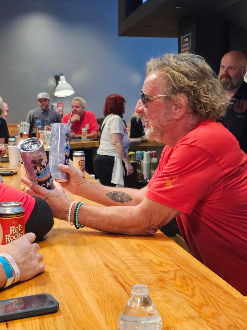 Sammy Hagar greets guests during a launch party for his Red Rocker Beer at the Fillmore Detroit's State Bar on Monday, Oct. 23, 2023.