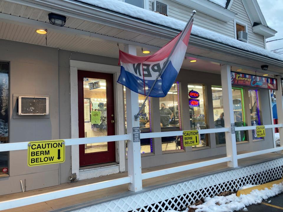 The exterior of a Leominster barbershop, where Francisco Torres walked into the shop and said he wanted someone to shoot him with an automatic weapon. A week later, Torres was arrested for allegedly trying to stab a flight attendant on a flight from Los Angeles to Boston.