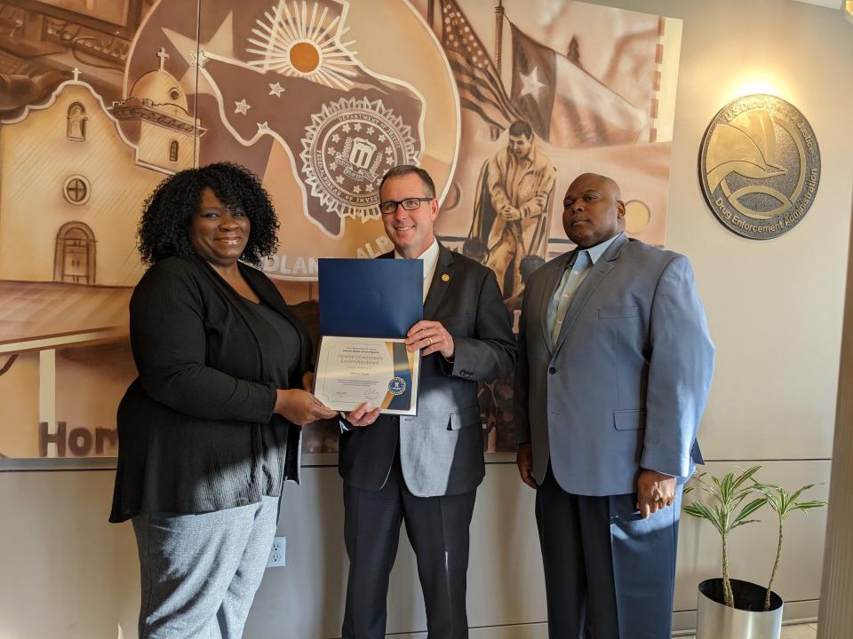 Monica Tucker, founder of Black El Paso Voice, is presented the 2022 Director’s Community Leadership Award for the FBI El Paso Field Office by Special Agent in Charge Jeffrey R. Downey.