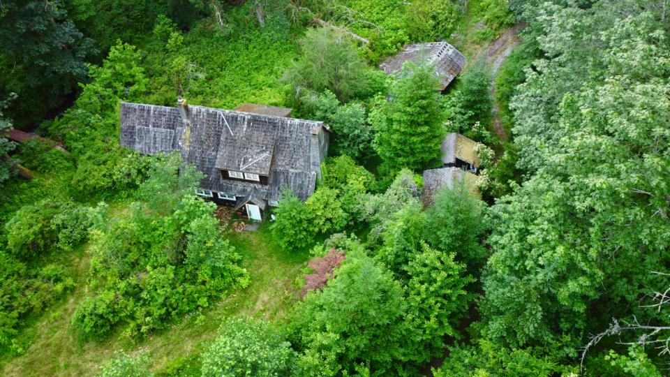 An aerial photo shows some of the structures in Hidden Valley that were in various states of disrepair and that threatened the environment and safety of the Rhododendron Preserve.