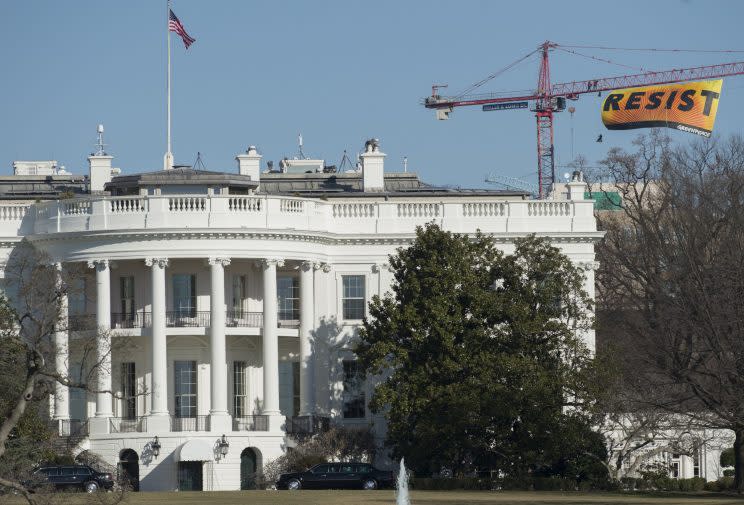 The Greenpeace protest banner can be seen from beyond the White House