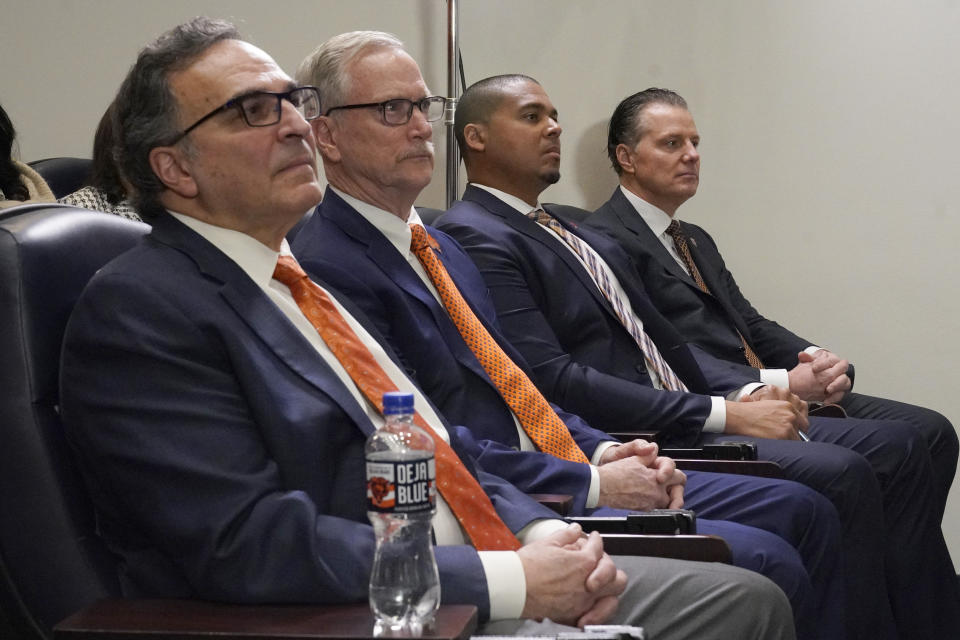 Chicago Bears NFL football team President and CEO Ted Phillips, left, Chairman George H. McCaskey, second from left, general manager Ryan Poles, second from right, and head coach Matt Eberflus listen to new President & CEO Kevin Warren speech during a news conference at Halas Hall in Lake Forest, Ill., Tuesday, Jan. 17, 2023. (AP Photo/Nam Y. Huh)