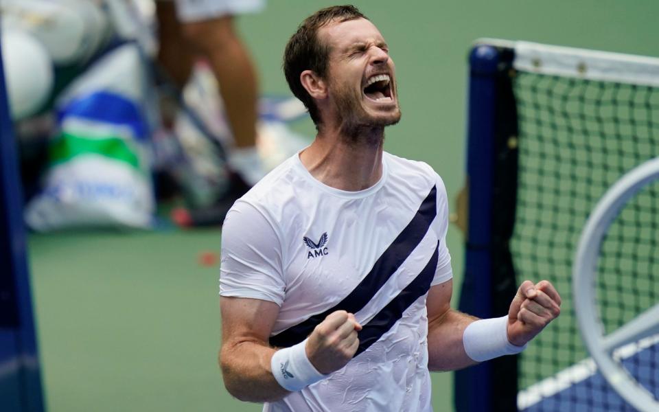 Murray celebrates winning after over four and a half hours on court - AP