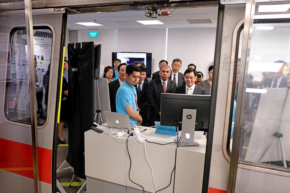 Finance Minister Heng Swee Keat (right, in glasses) attending the official opening of the SMRT-NTU Smart Urban Rail Corporate Laboratory on 29 August, 2018. (PHOTO: NTU)