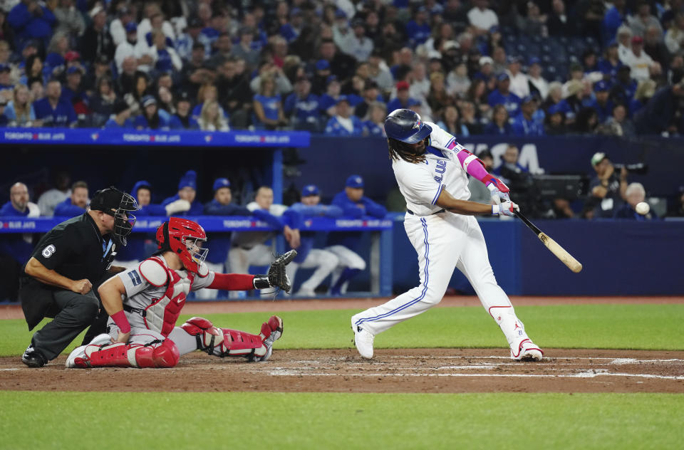 Toronto Blue Jays' Vladimir Guerrero Jr. hits a three-run home run against the Boston Red Sox during the third inning of a baseball game Friday, Sept. 15, 2023, in Toronto. (Chris Young/The Canadian Press via AP)